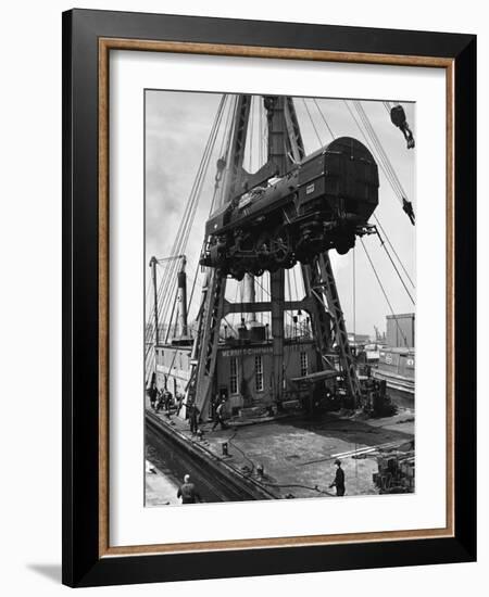 Locomotive Hoisted by Merritt-Chapman-Scott Crane Headed for France to Boost the Postwar Effort-Andreas Feininger-Framed Photographic Print