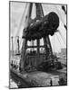 Locomotive Hoisted by Merritt-Chapman-Scott Crane Headed for France to Boost the Postwar Effort-Andreas Feininger-Mounted Photographic Print