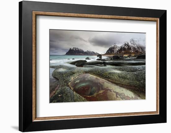 Lofoten, Norway. The famous eye of Utakleiv, one of the many features of the beach.-ClickAlps-Framed Photographic Print
