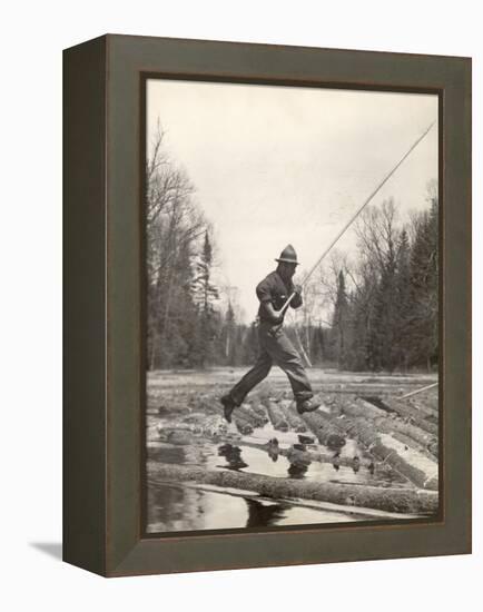 Log Driver Leaping Across Floating Logs to Keep Them Moving by Breaking Loose Any That Get Jammed-Margaret Bourke-White-Framed Premier Image Canvas