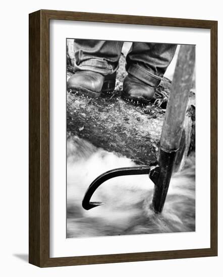 Log Driver's Feet Using a Peavey, to Control Lumber Floating Down River Headed for Paper Mill-Margaret Bourke-White-Framed Premium Photographic Print