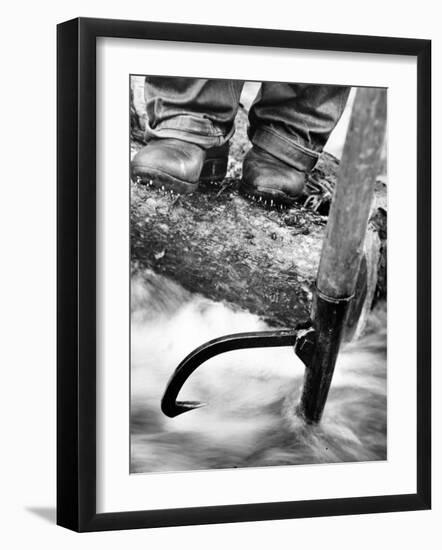 Log Driver's Feet Using a Peavey, to Control Lumber Floating Down River Headed for Paper Mill-Margaret Bourke-White-Framed Photographic Print