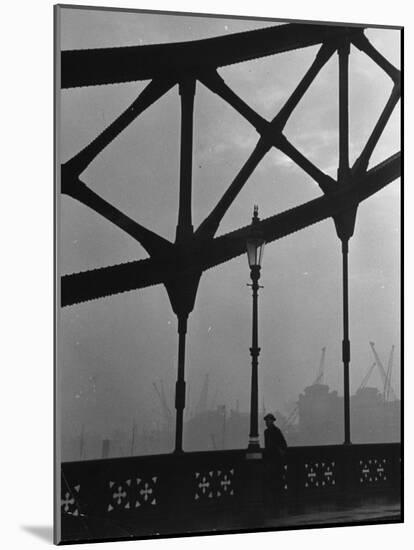 London Bobby in His Wartime Tin Helmet Patrolling the Tower Bridge-Carl Mydans-Mounted Photographic Print
