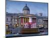 London National Gallery is illuminated at twilight with Trafalgar Square fountain-Charles Bowman-Mounted Photographic Print