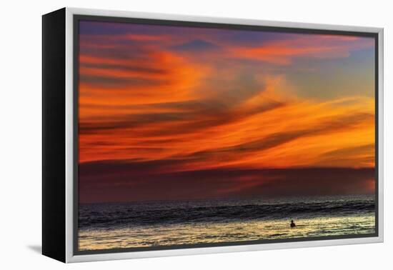 Lone Surfer and Sunset Clouds Off Playa Hermosa Surf Beach, Santa Teresa, Costa Rica-Rob Francis-Framed Premier Image Canvas