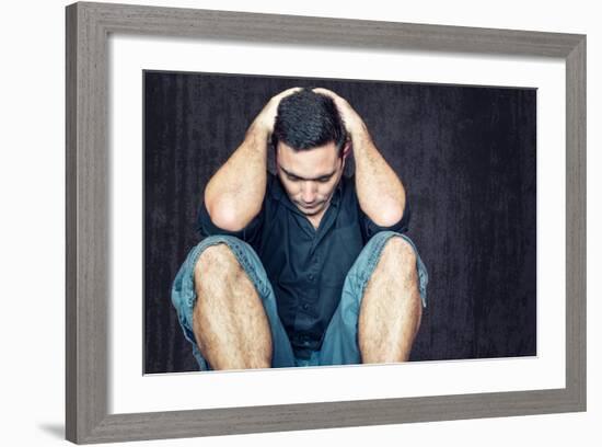 Lonely and Sad Young Man Sitting on the Floor with His Head between His Hands-Kamira-Framed Photographic Print