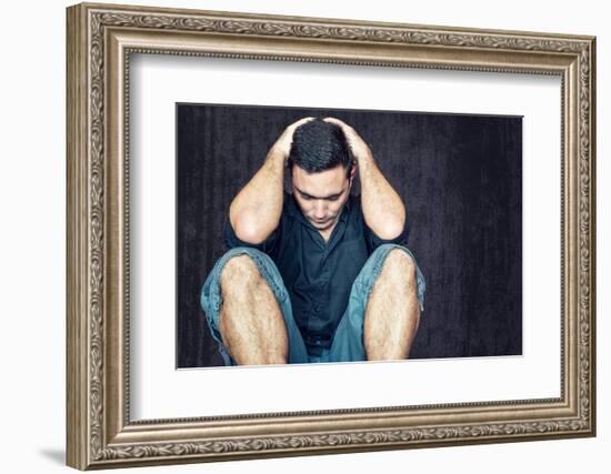 Lonely and Sad Young Man Sitting on the Floor with His Head between His Hands-Kamira-Framed Photographic Print