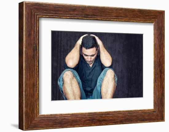 Lonely and Sad Young Man Sitting on the Floor with His Head between His Hands-Kamira-Framed Photographic Print