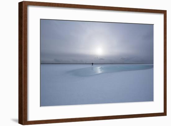 Lonely Person in Icelandic Lowlands with Blue Puddle of Water and Sun in the Background, Winter-Niki Haselwanter-Framed Photographic Print