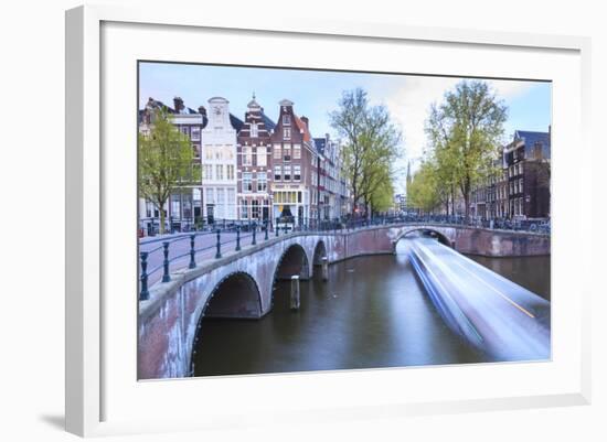 Long Exposure of a Tourist Boat Crossing Canals Keizersgracht from Leidsegracht at Dusk-Amanda Hall-Framed Photographic Print