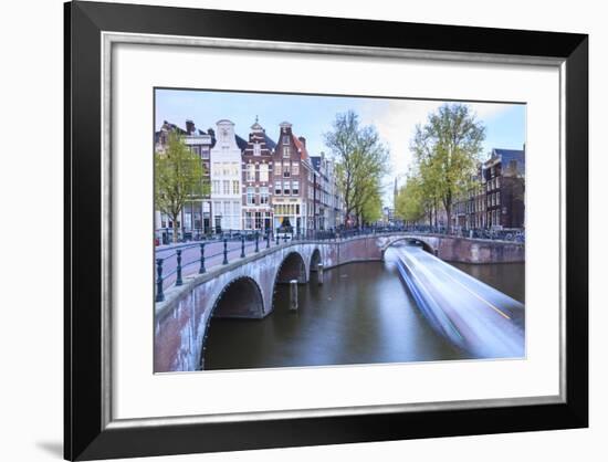 Long Exposure of a Tourist Boat Crossing Canals Keizersgracht from Leidsegracht at Dusk-Amanda Hall-Framed Photographic Print