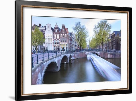 Long Exposure of a Tourist Boat Crossing Canals Keizersgracht from Leidsegracht at Dusk-Amanda Hall-Framed Photographic Print