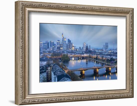 Long exposure of clouds at dusk over the illuminated city skyline and Ignatz Bubis bridge-Roberto Moiola-Framed Photographic Print