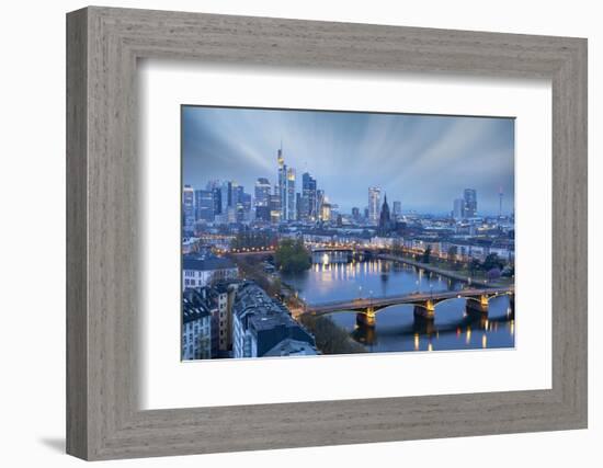 Long exposure of clouds at dusk over the illuminated city skyline and Ignatz Bubis bridge-Roberto Moiola-Framed Photographic Print