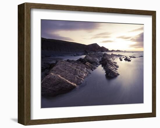 Long Exposure of Waves Moving over Rocks on Crackington Haven Beach at Sunset, Cornwall, England-Ian Egner-Framed Photographic Print