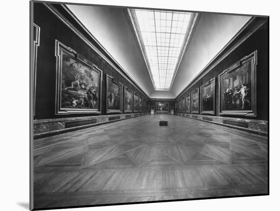 Long Gallery of Paintings at Louvre Museum with Skylight Ceilings-Nat Farbman-Mounted Photographic Print