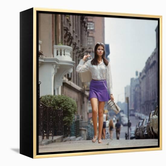 Long Hair Woman with short skirt, lace top and sandals walking up street in "New York Look" fashion-Vernon Merritt III-Framed Premier Image Canvas