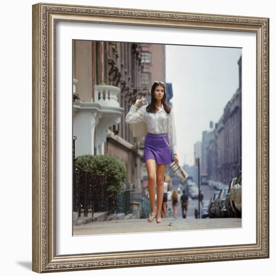 Long Hair Woman with short skirt, lace top and sandals walking up street in "New York Look" fashion-Vernon Merritt III-Framed Photographic Print