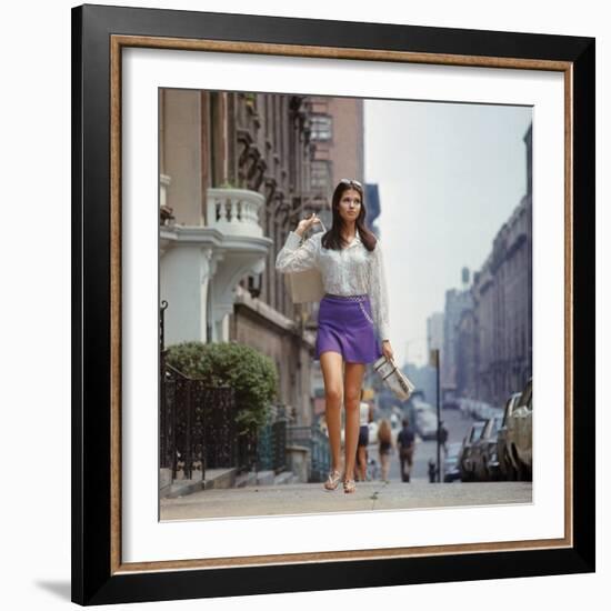 Long Hair Woman with short skirt, lace top and sandals walking up street in "New York Look" fashion-Vernon Merritt III-Framed Photographic Print