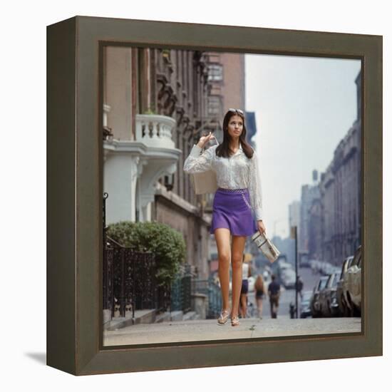 Long Hair Woman with short skirt, lace top and sandals walking up street in "New York Look" fashion-Vernon Merritt III-Framed Premier Image Canvas