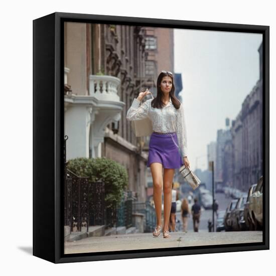 Long Hair Woman with short skirt, lace top and sandals walking up street in "New York Look" fashion-Vernon Merritt III-Framed Premier Image Canvas