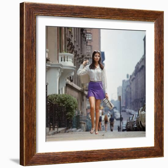 Long Hair Woman with short skirt, lace top and sandals walking up street in "New York Look" fashion-Vernon Merritt III-Framed Photographic Print