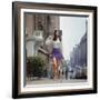 Long Hair Woman with short skirt, lace top and sandals walking up street in "New York Look" fashion-Vernon Merritt III-Framed Photographic Print