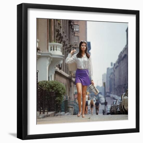 Long Hair Woman with short skirt, lace top and sandals walking up street in "New York Look" fashion-Vernon Merritt III-Framed Photographic Print