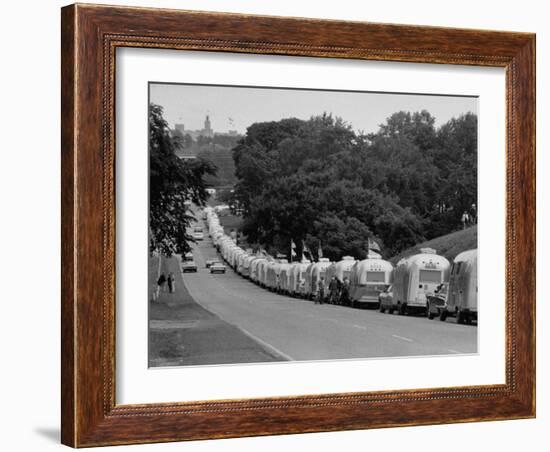 Long Line of Airstream Trailers Wait for Parking Space at a Campground During a Trailer Rally-Ralph Crane-Framed Photographic Print