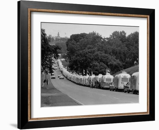 Long Line of Airstream Trailers Wait for Parking Space at a Campground During a Trailer Rally-Ralph Crane-Framed Photographic Print