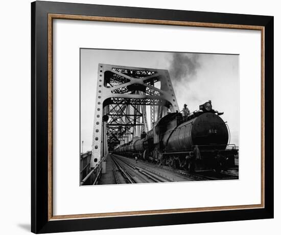 Long String of Tank Cars Rumbling Across the 4 1/2 Mile Huey Long Bridge at New Orleans-Peter Stackpole-Framed Premium Photographic Print