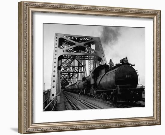 Long String of Tank Cars Rumbling Across the 4 1/2 Mile Huey Long Bridge at New Orleans-Peter Stackpole-Framed Photographic Print