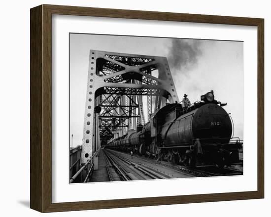 Long String of Tank Cars Rumbling Across the 4 1/2 Mile Huey Long Bridge at New Orleans-Peter Stackpole-Framed Photographic Print