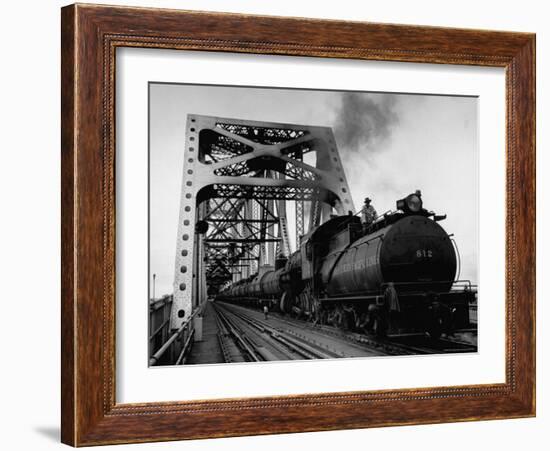 Long String of Tank Cars Rumbling Across the 4 1/2 Mile Huey Long Bridge at New Orleans-Peter Stackpole-Framed Photographic Print