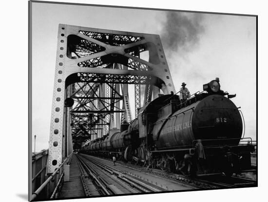 Long String of Tank Cars Rumbling Across the 4 1/2 Mile Huey Long Bridge at New Orleans-Peter Stackpole-Mounted Photographic Print