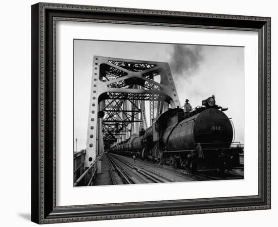 Long String of Tank Cars Rumbling Across the 4 1/2 Mile Huey Long Bridge at New Orleans-Peter Stackpole-Framed Photographic Print