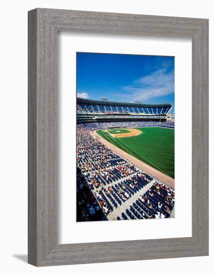 Long view of Baseball diamond and bleachers during professional Baseball Game, Comiskey Park, Il...-null-Framed Photographic Print