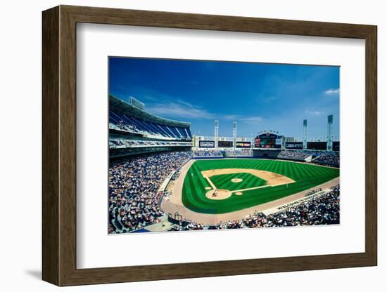 Long view of Baseball diamond and bleachers during professional Baseball Game, Comiskey Park, Il...-null-Framed Photographic Print