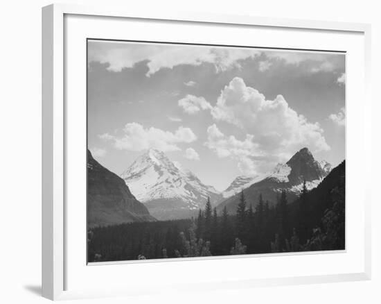 Looking Across Forest To Mountains And Clouds "In Glacier National Park" Montana. 1933-1942-Ansel Adams-Framed Art Print