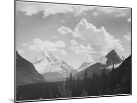Looking Across Forest To Mountains And Clouds "In Glacier National Park" Montana. 1933-1942-Ansel Adams-Mounted Art Print