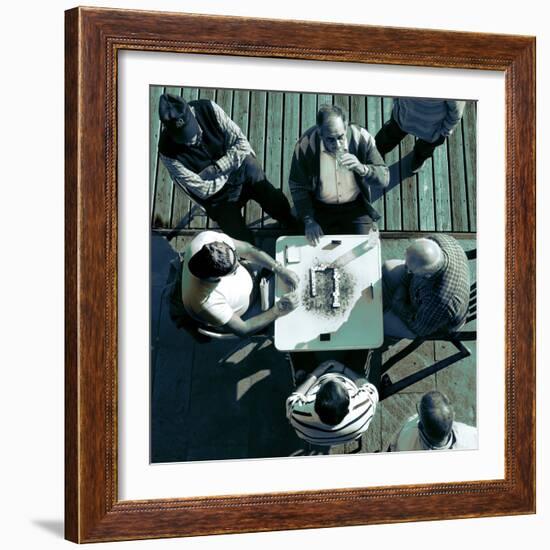 Looking Down at Men Playing Dominoes-Eudald Castells-Framed Photographic Print