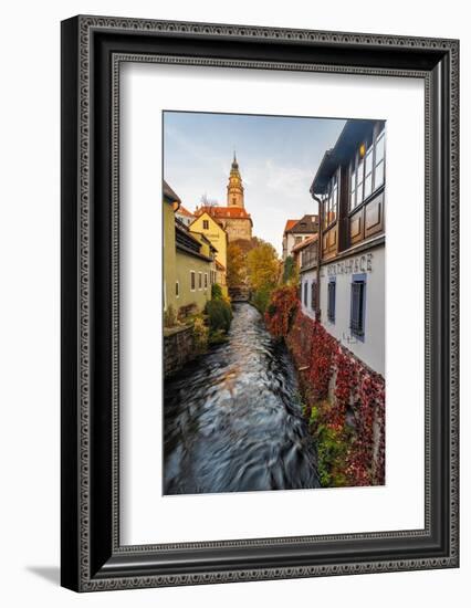 Looking down canal to Castle Tower in Cesky Krumlov, Czech Republic-Chuck Haney-Framed Photographic Print