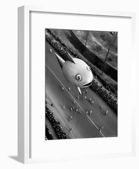 Looking Down Onto Fish Balloon and Crowds Lining Street During Macy's Thanksgiving Day Parade-John Phillips-Framed Photographic Print