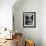 Looking Down Row of Empty Scarred Old Fashioned Desks in Schoolroom-Walter Sanders-Framed Photographic Print displayed on a wall