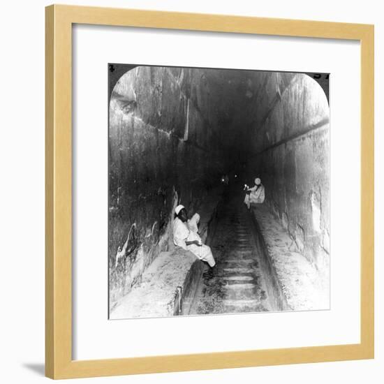 Looking Down the Main Passage to Khufu's Sepulchre Within the Great Pyramid, Egypt, 1905-Underwood & Underwood-Framed Photographic Print