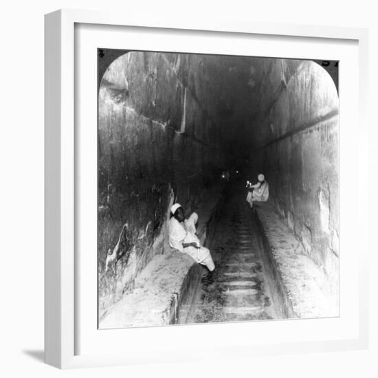 Looking Down the Main Passage to Khufu's Sepulchre Within the Great Pyramid, Egypt, 1905-Underwood & Underwood-Framed Photographic Print