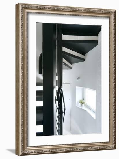 Looking under the Steel Spiral Staircase to a Side Window-Nigel Rigden-Framed Photo