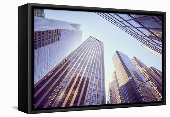 Looking up at Manhattan Skyscrapers at Sunset-Maciej Bledowski-Framed Premier Image Canvas