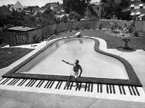 Liberace at the 'Piano' Shaped Pool in His Home-Loomis Dean-Premium Photographic Print