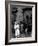 Lorenza Curiel in White First Communion Dress Waiting for Mother to Lock Door-W^ Eugene Smith-Framed Photographic Print